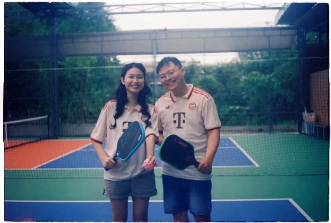 Three pickleball paddles displaying graphite, carbon fiber, and composite materials with distinct textures and grip details f